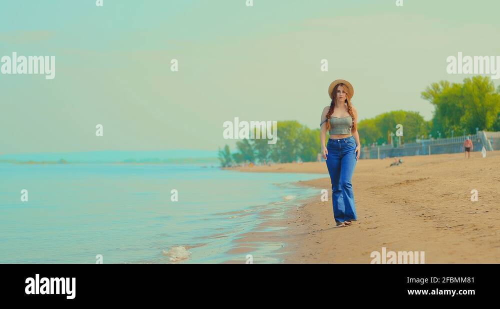 Woman in jeans on the beach Stock Videos & Footage HD and 4K Video