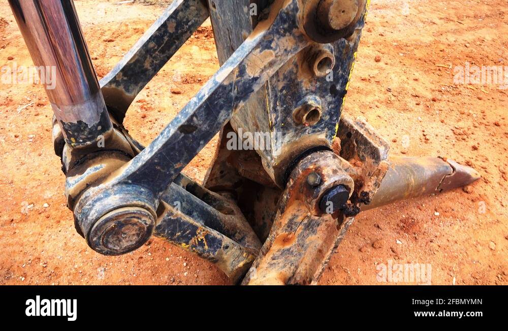 Panning up the knuckle boom and hydraulic arm of a mechanical digger