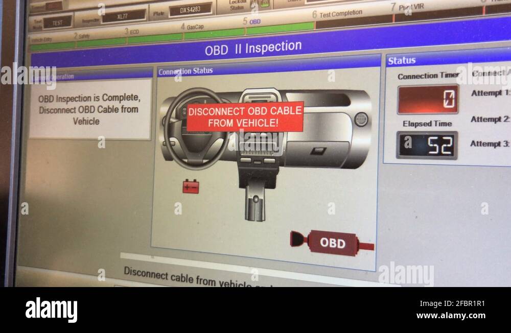 Vehicle emissions inspection being performed on Toyota. OBD inspection