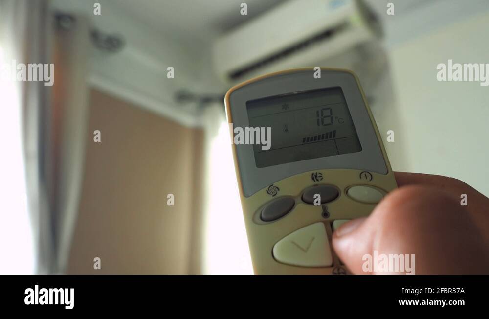 Push the remote button air conditioner for increed temperature from 18