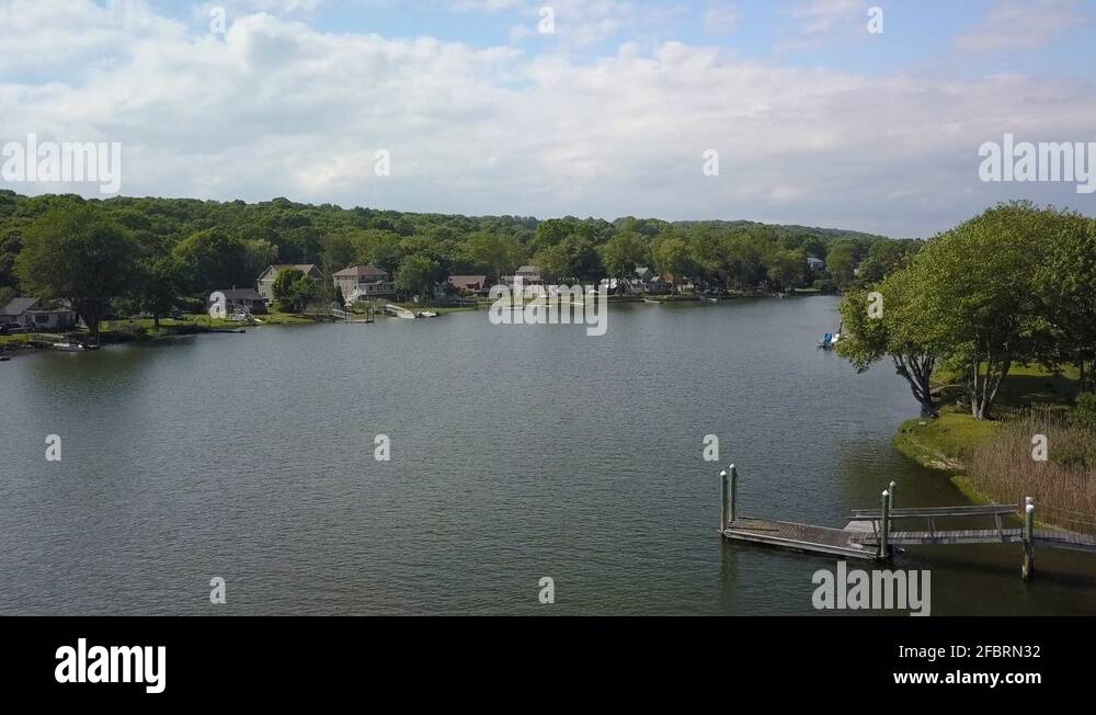 Aerial view of cottages along banks of Narrow river in Rhode Island ...