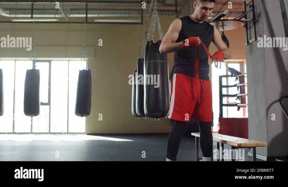 Videos Compilation of Sportsman Taping Hands for Boxing Stock Video