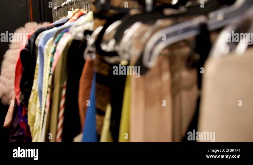 Clothes on rack backstage at a fashion show Stock Video Footage - Alamy