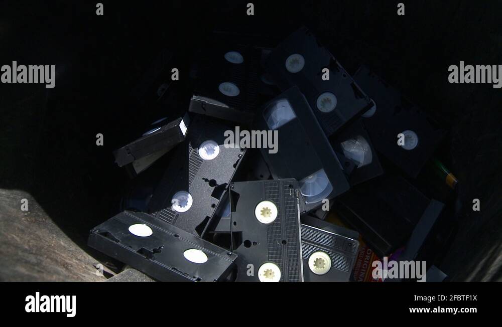 old VHS tapes tossed in garbage, the passing of a format Stock Video Footage Alamy