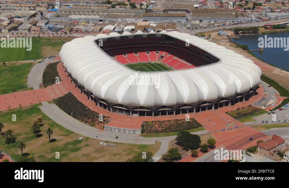 Close aerial orbit Nelson Mandela Bay Stadium, see goal posts on