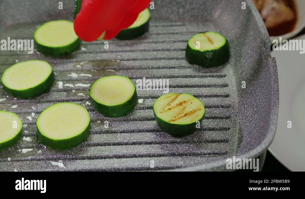 Pan fried courgettes Stock Videos & Footage HD and 4K Video Clips Alamy