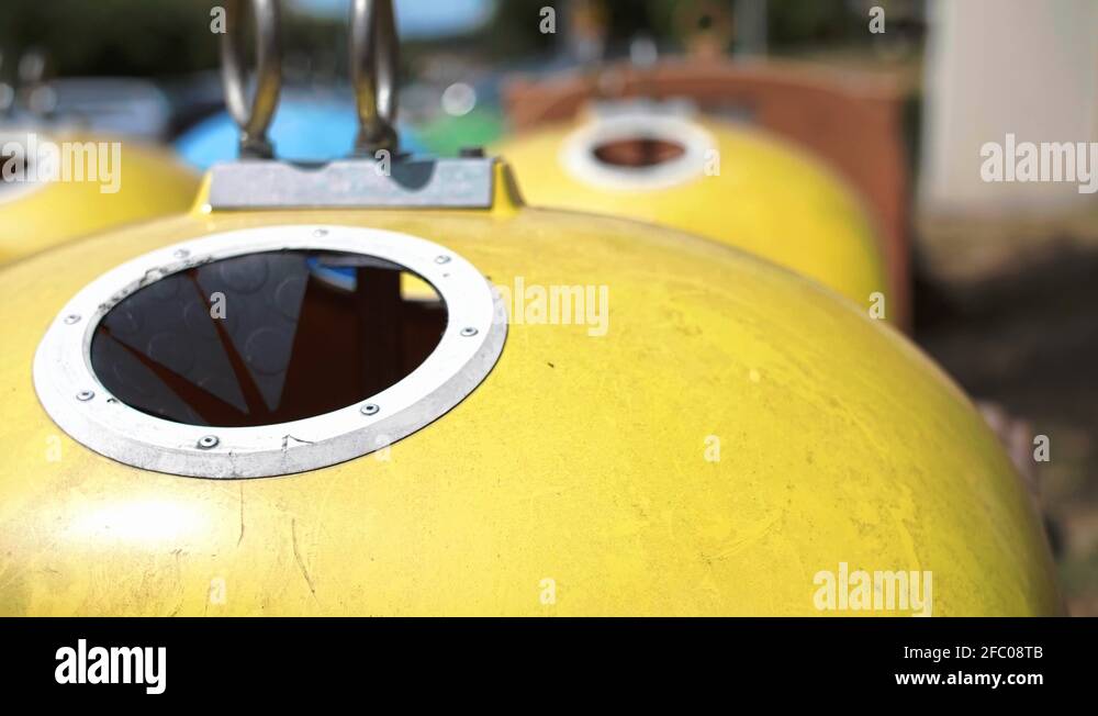 Man putting bubble wrap into recycling bin Stock Video Footage Alamy