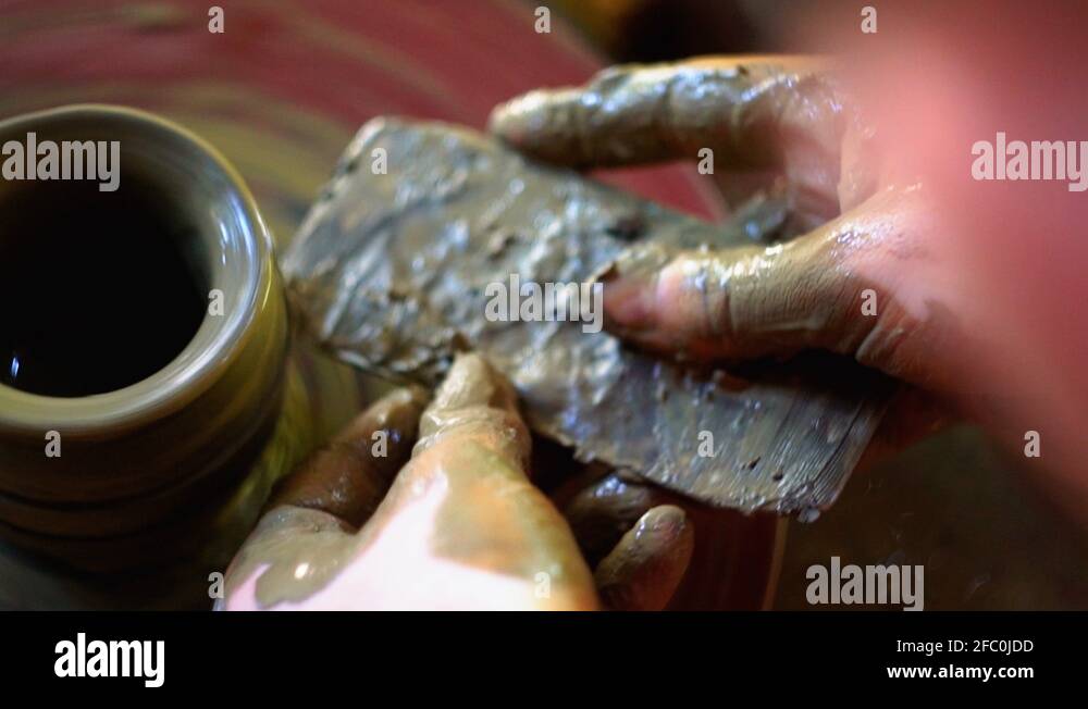 Pottery making spinning wheel clay Stock Videos & Footage HD and 4K
