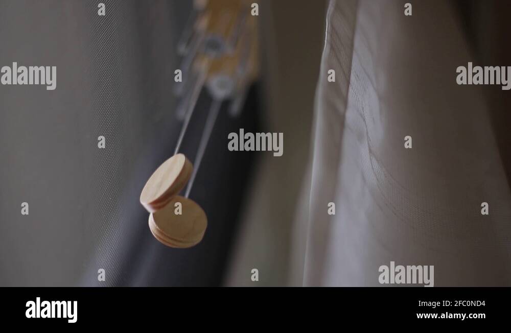 Wind chimes ringing in wind Stock Video Footage Alamy