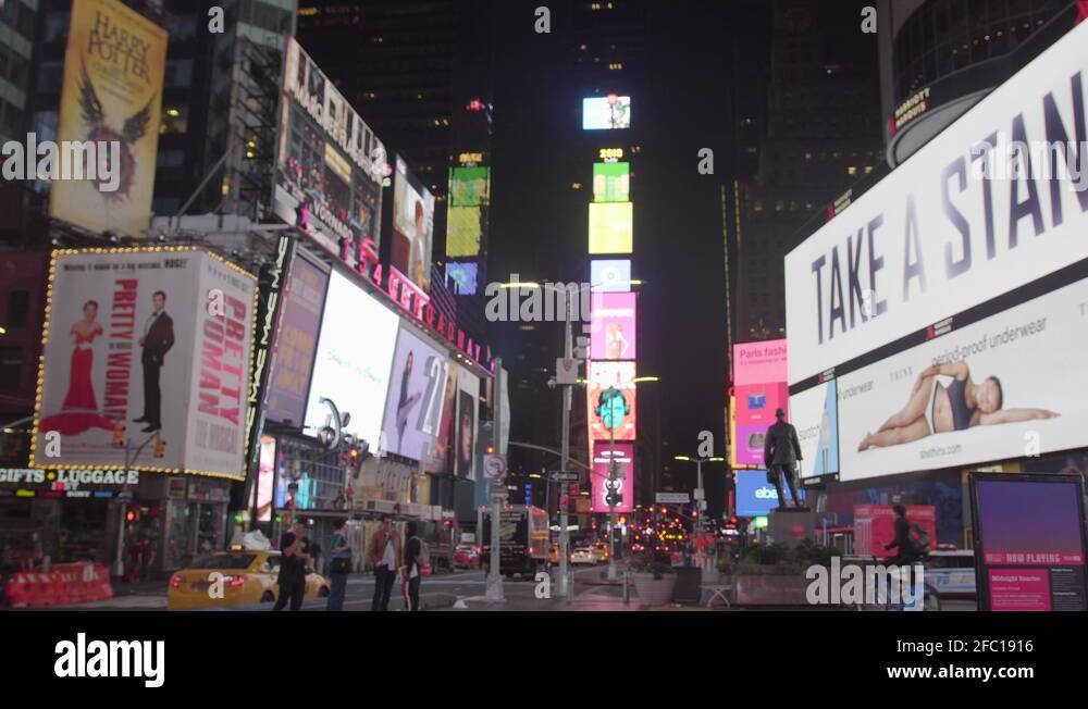 Times Square in New York at night with advertising screens 4K Stock