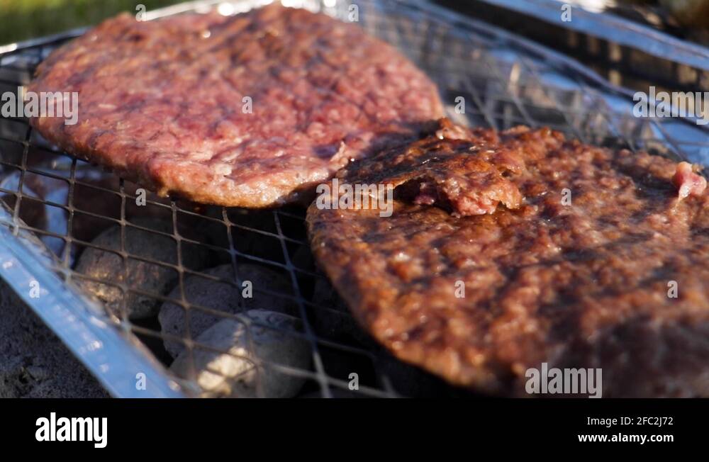 Burgers cooking on a barbecue Stock Videos & Footage HD and 4K Video