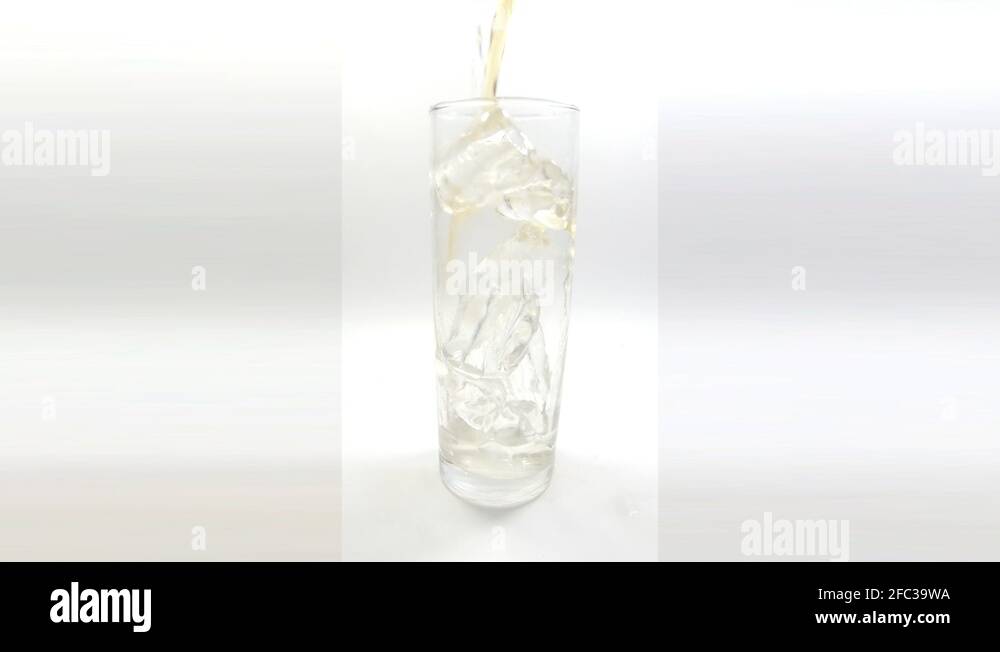 Brown Liquor and Sprite Making ,of ,a ,Cocktail, in ,White background Stock Video Footage Alamy