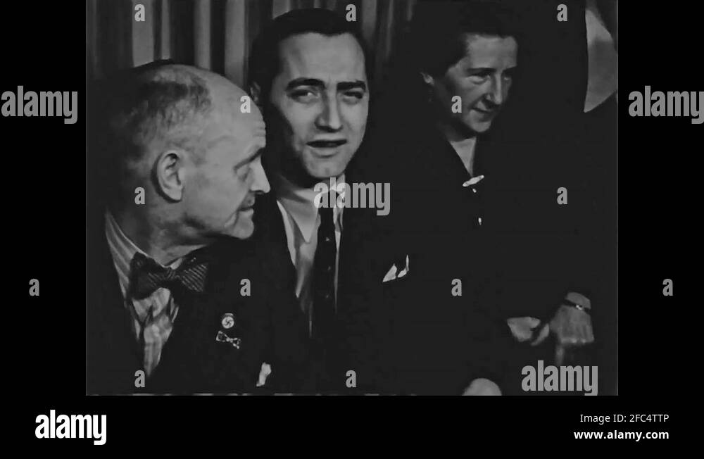 WW2 - Party by Eva Brauns family - Father speak to gueasts Stock Video ...
