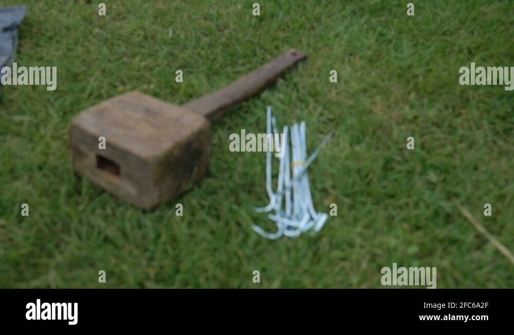 Tent peg and hammer Stock Videos & Footage HD and 4K Video Clips Alamy