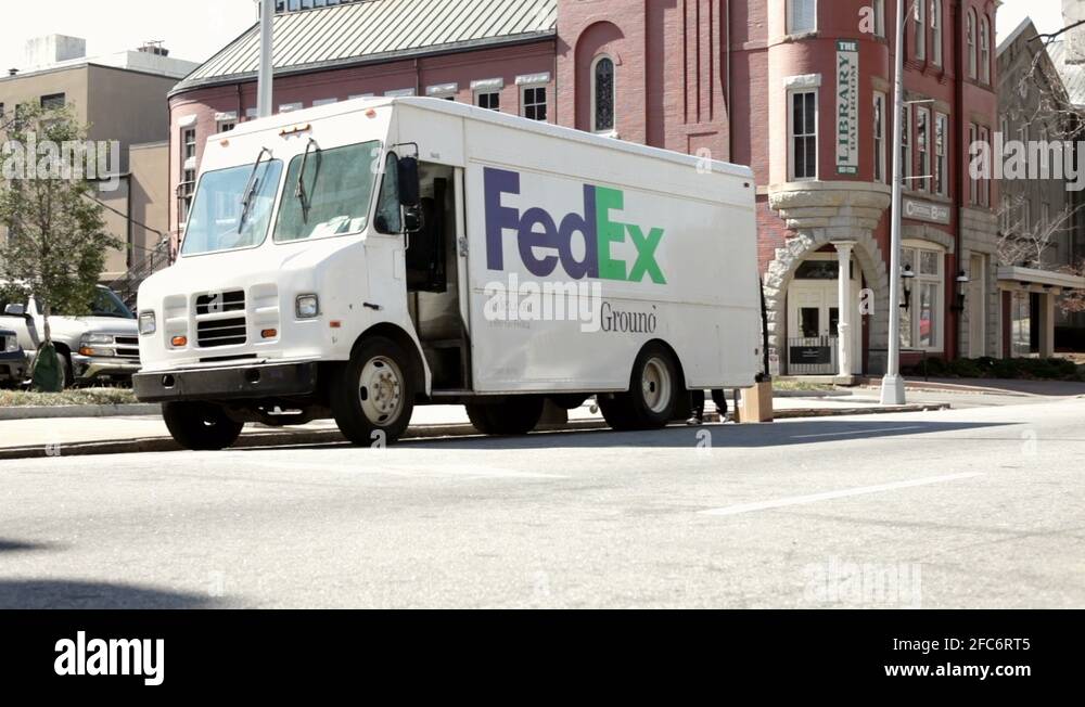 Fedex truck sitting on street in Macon Georgia Stock Video Footage - Alamy