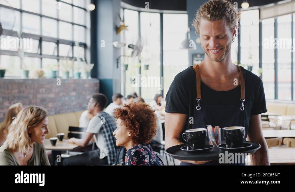 Busy cafe Stock Videos & Footage - HD and 4K Video Clips - Alamy