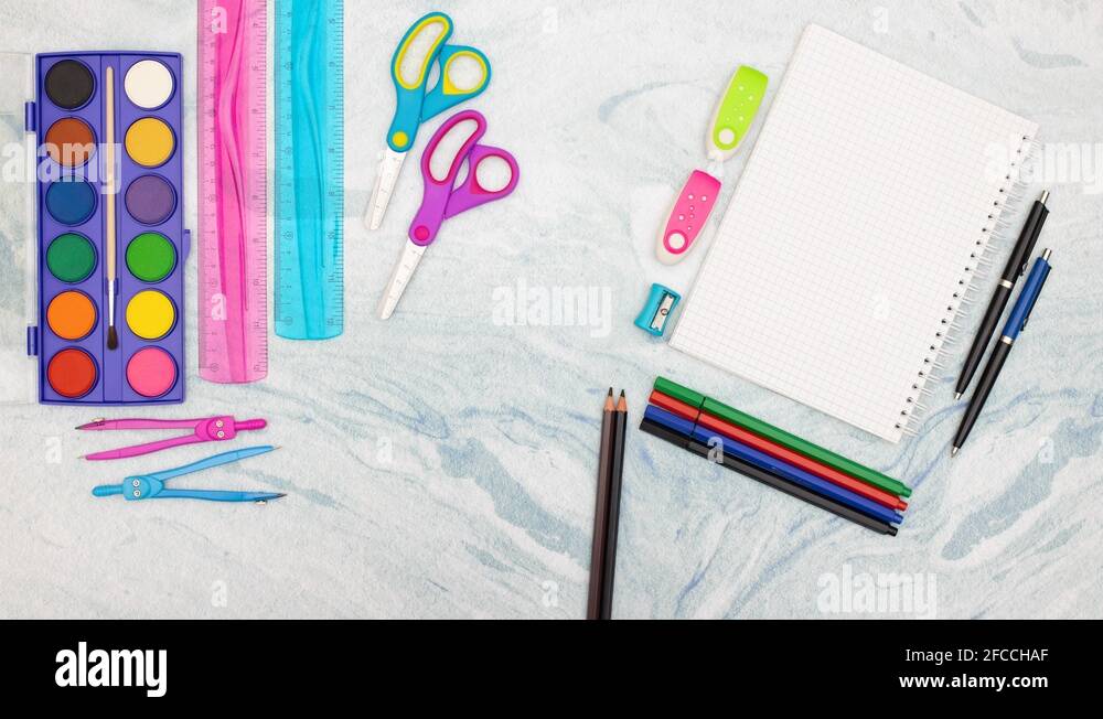 Colored pencils appear and disappear surrounded with school supplies