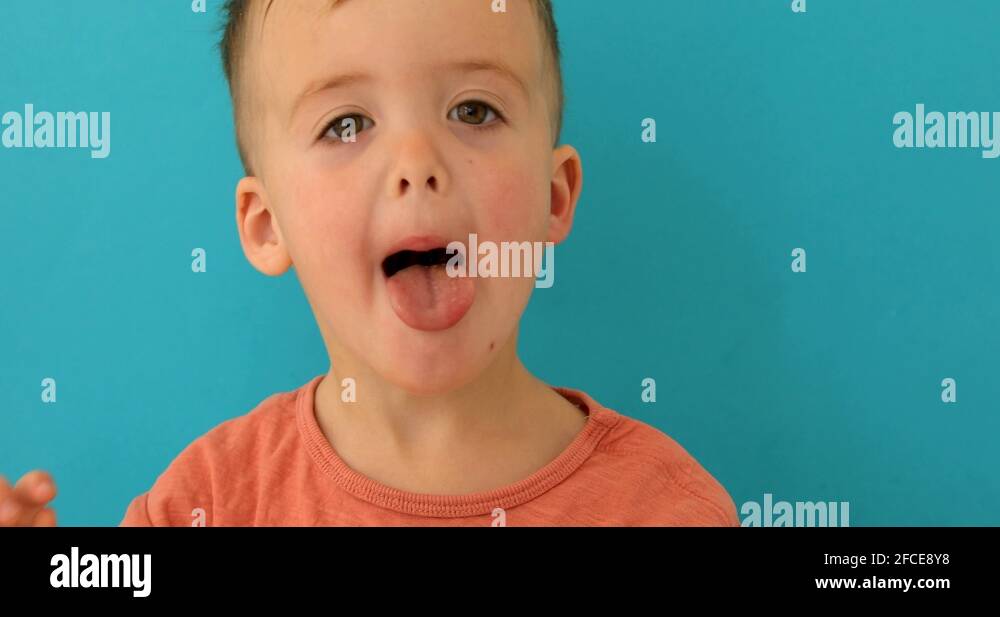 Child sticking out tongue Stock Videos & Footage HD and 4K Video