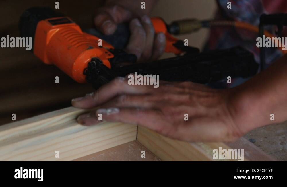 Carpenter using nail gun Stock Videos & Footage HD and 4K Video Clips