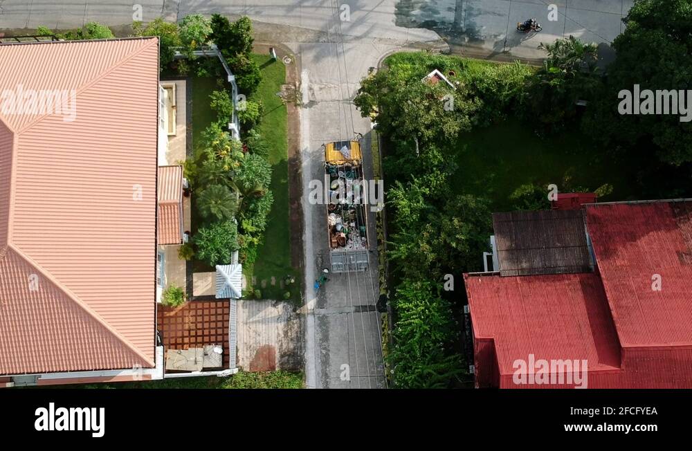 Garbage Truck on Garbage Collection Day, Quezon City, Philippines Stock