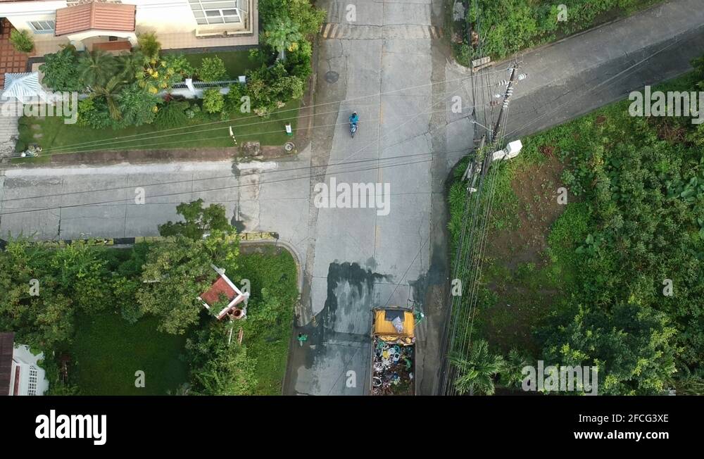 Garbage Truck on Garbage Collection Day, Quezon City, Philippines Stock