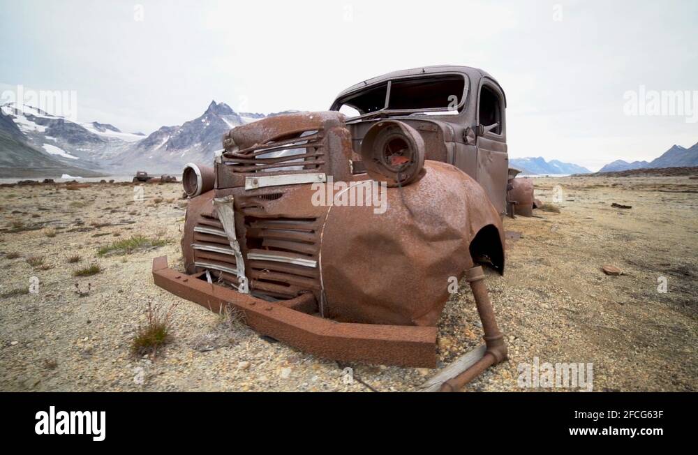 Abandoned Military Base in Greenland. Trucks and Barrels left to Rot