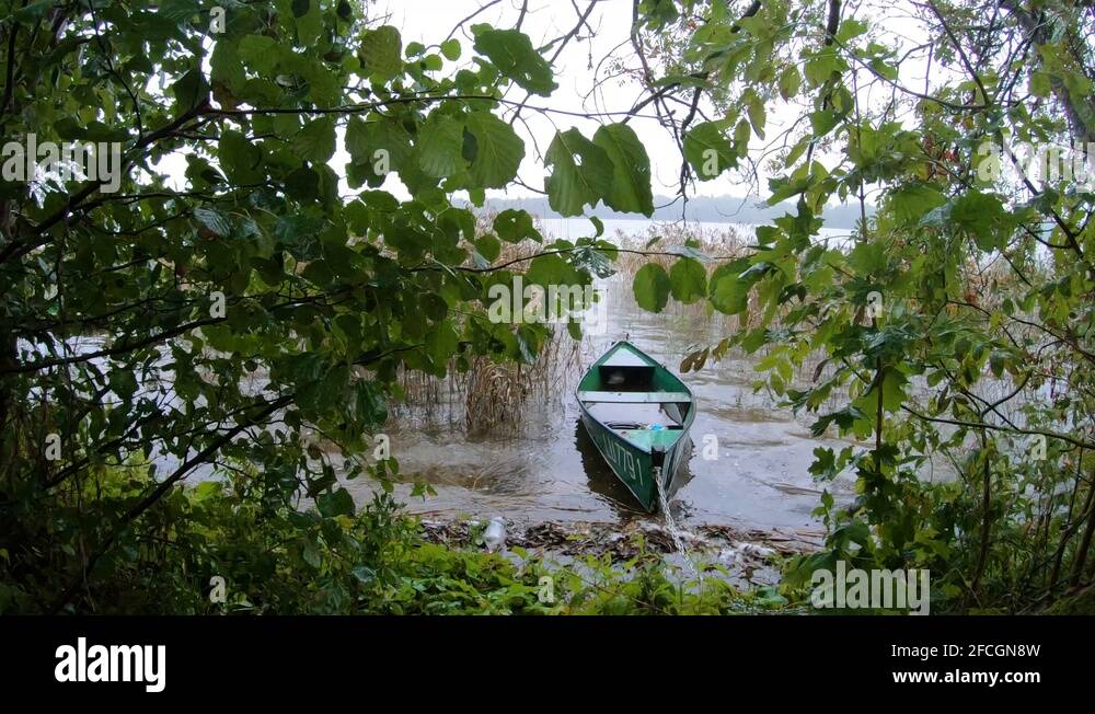 Boat tied up on lake Stock Videos & Footage - HD and 4K Video Clips - Alamy