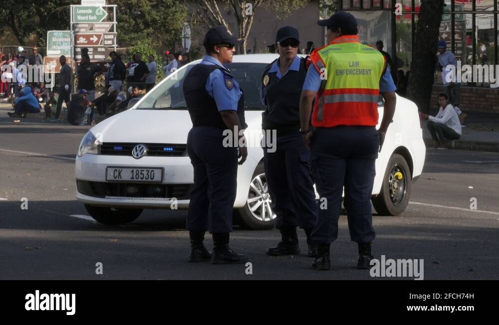 female-south-african-law-enforcement-officers-block-a-road-during-civil