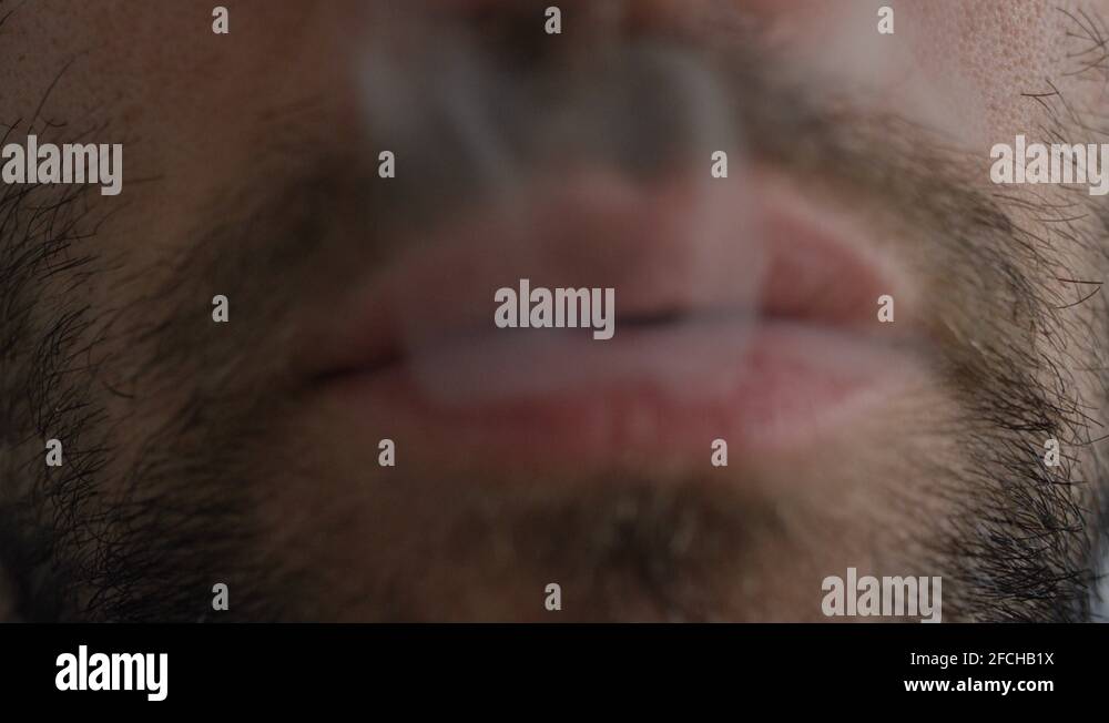 Adult Male Smoking A Vape Pen Stock Video Footage Alamy