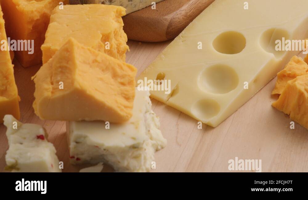 Variety of Cheeses; Cheddar, Blue Cheese, Swiss, Pepper Jack Stock