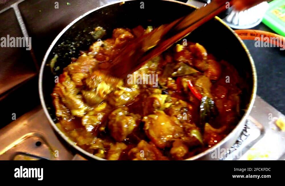 Indian mutton curry Stock Videos & Footage - HD and 4K Video Clips - Alamy