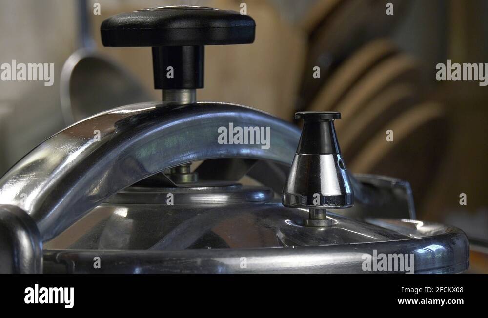 Pressure cooker valve relieves pressure and rotates Stock Video Footage