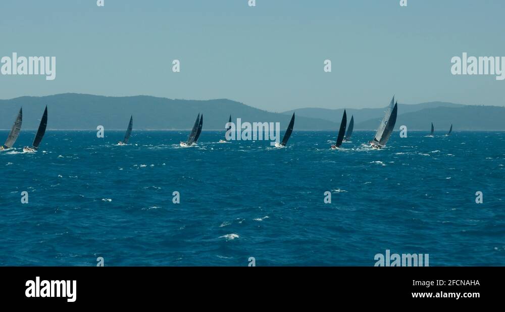 Sunrise aerial Whitsunday Island sailing Great Barrier Reef Stock Video
