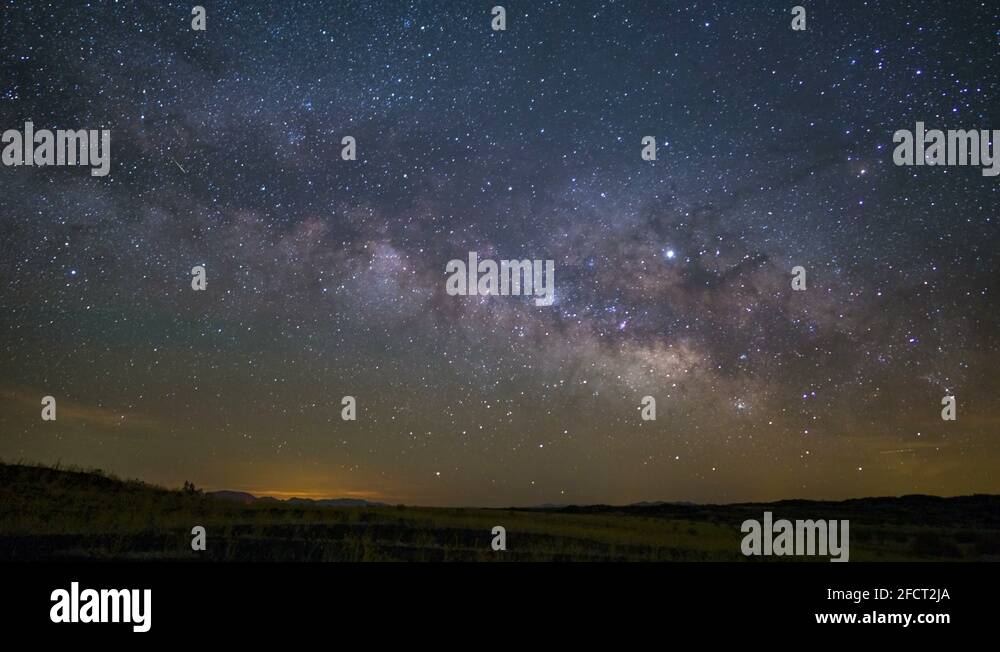 5K Astro timelapse of Milky Way Galaxy Rising over Wildflowers in ...