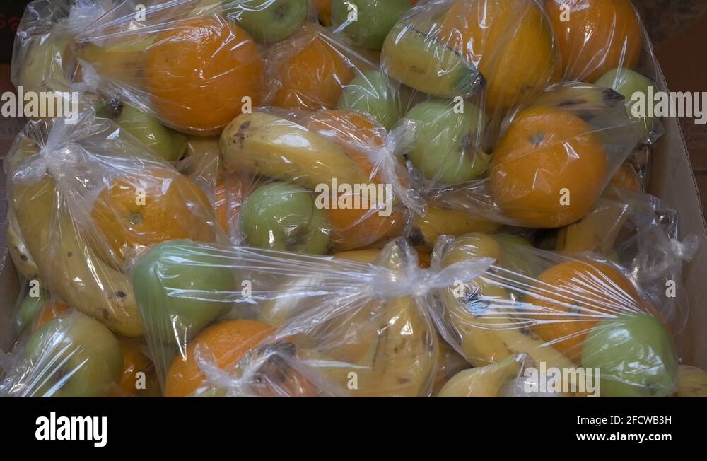 Banana wrapped in plastic Stock Videos & Footage HD and 4K Video