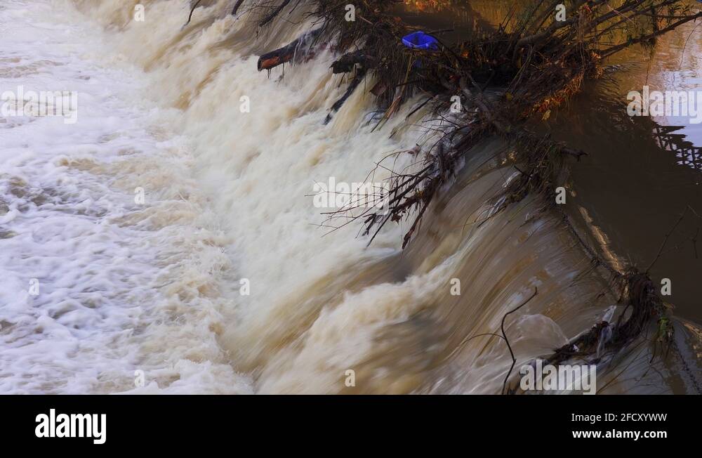 Debris caught on the cascade during high water levels close to flooding
