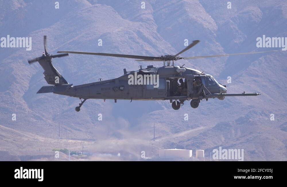 Sikorsky HH60G Pave Hawk helicopter flying over Stock Video Footage