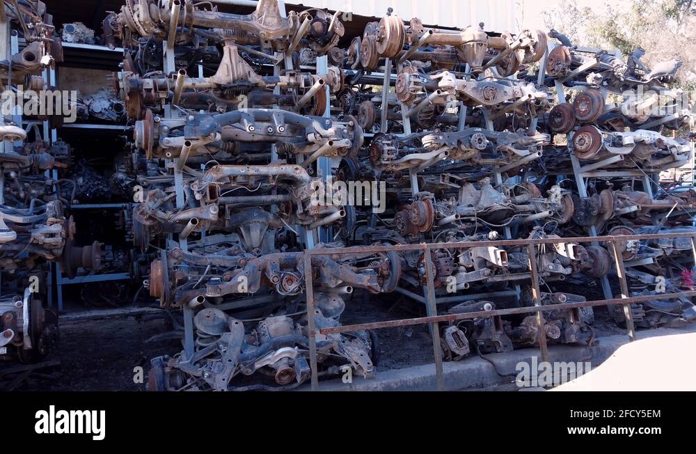 Pile of Second Hand Old Rusted Car Vehicle Parts, Wheel Studs and Break