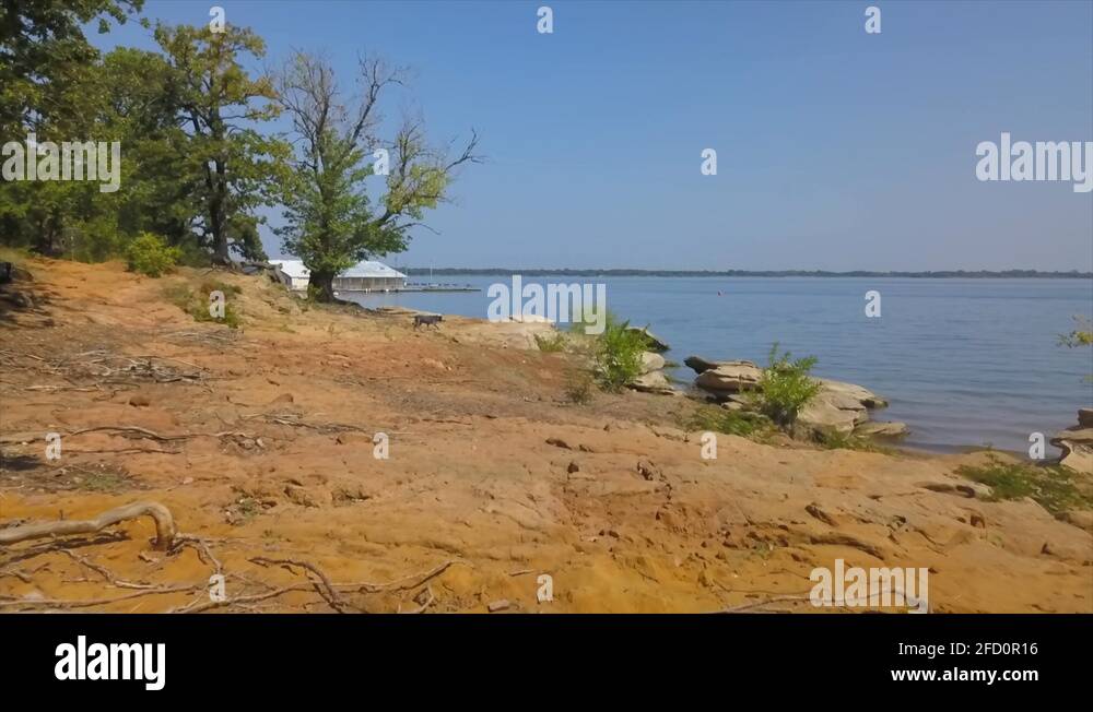 Lake Lewisville Beach to Lake reveal Stock Video Footage Alamy