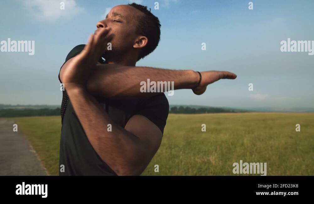 Sporty african man stretching arms Stock Videos & Footage - HD and 4K ...