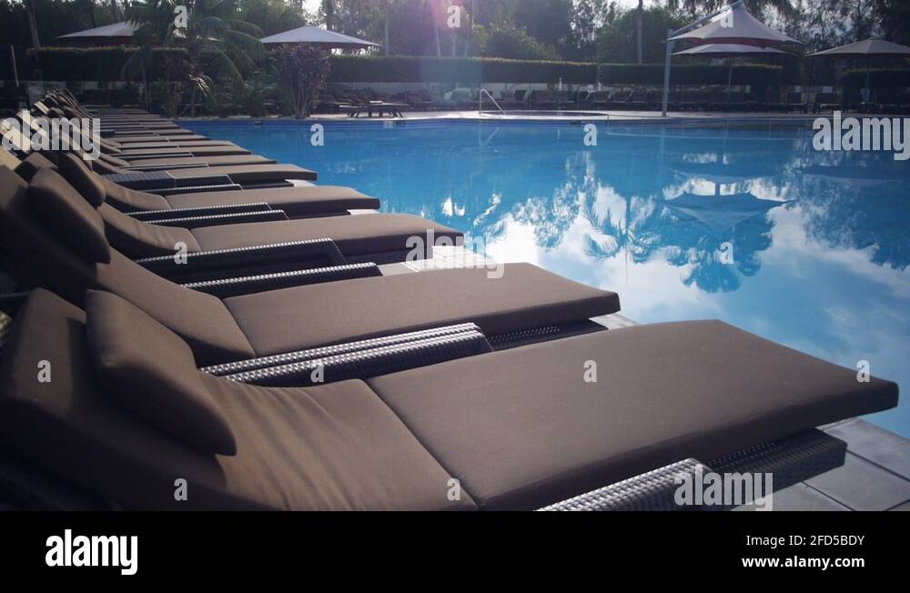 Chairs by pool Stock Videos & Footage HD and 4K Video Clips Alamy