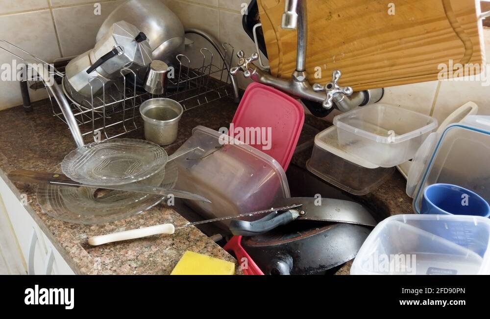 Dirty sink. Bacteria proliferate easily in dirty dishes Stock Video