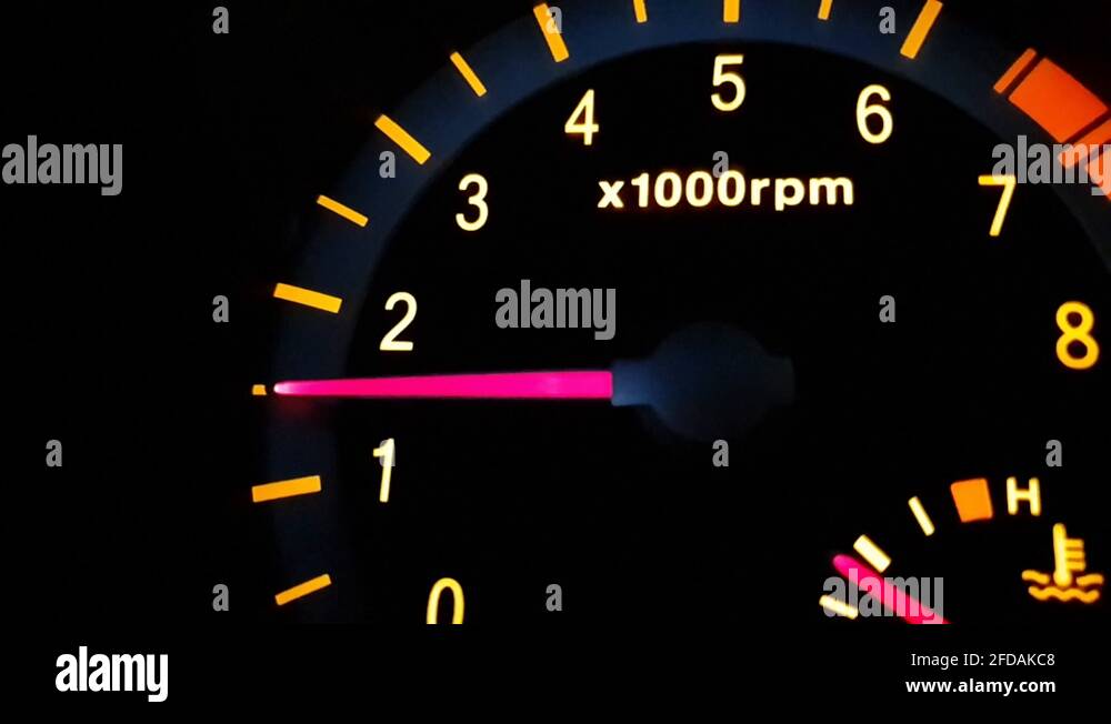Car revving it's internal combustion gasoline engine up to 3000rpm with