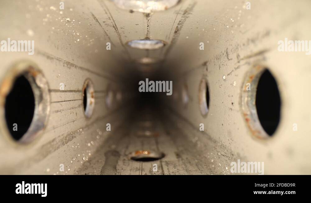 Perforated zinc plated steel tubing Stock Videos & Footage HD and 4K