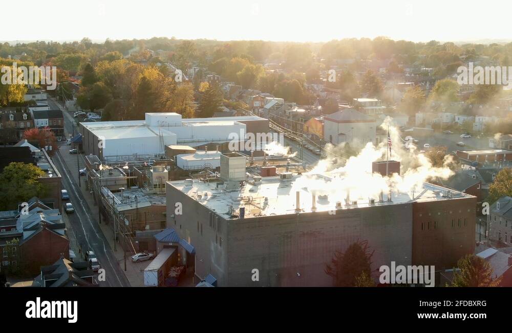 Steam rises from the Kunzler Meat factory in downtown Lancaster Stock Video Footage Alamy