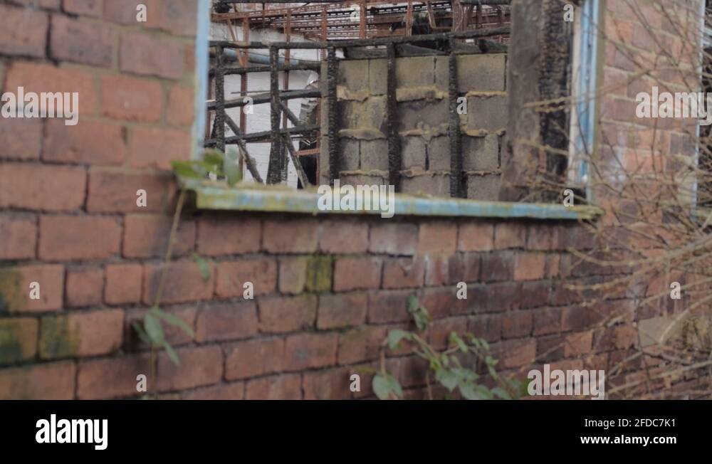 Brick through window Stock Videos & Footage HD and 4K Video Clips Alamy