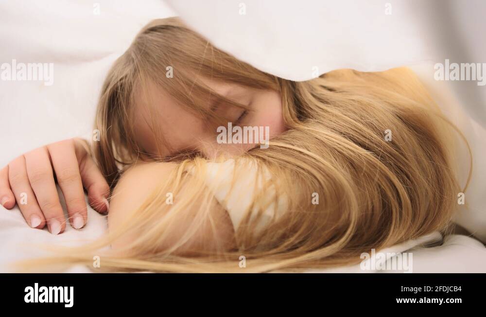 Woman sleeping in bed on white Stock Videos & Footage HD and 4K Video