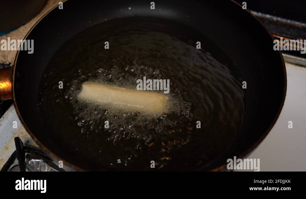 Deep frying egg Stock Videos & Footage HD and 4K Video Clips Alamy