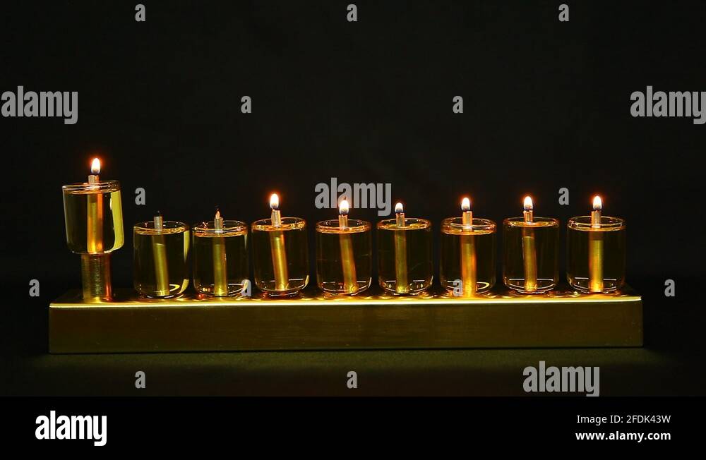 6 flames in Hanukia made of olive oil lanterns Stock Video Footage Alamy