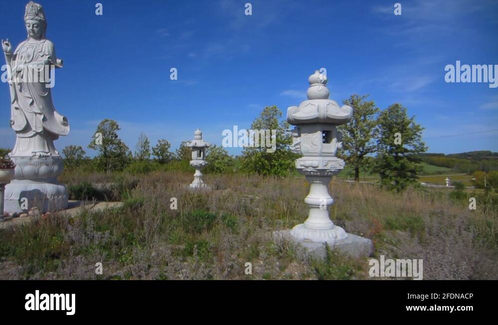 Stone statue of Buddha at buddhist temple in Bethany, Ontario, Canada Stock Video Footage Alamy